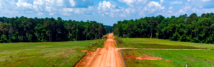 Learn how to improve rural access roads on large properties, including grading, drainage, vegetation control, and stabilization to reduce erosion and improve long-term usability in North Georgia.