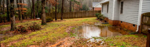 Muddy yards and standing water in North Georgia are grading problems with grading solutions. Learn what causes them and how professional grading corrections fix them in Cherokee County.