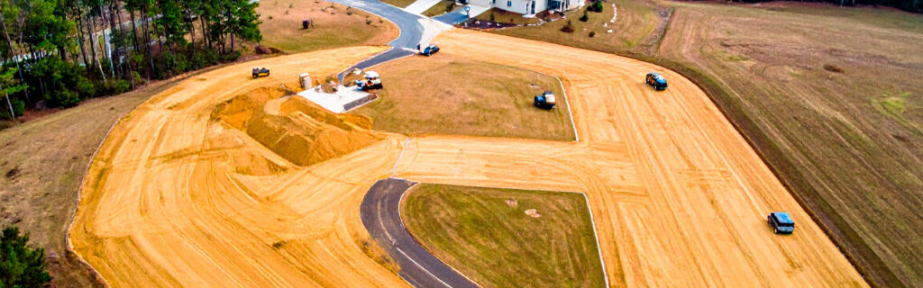 Elevation change on a North Georgia property determines drainage direction, earthwork scope, foundation requirements, and driveway design — not just what the land looks like. Learn the terrain elevation framework for outdoor project planning in Cherokee County.