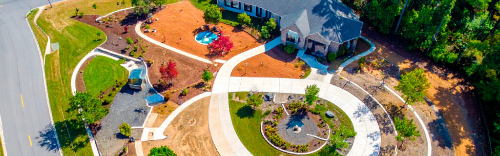 Location decisions for North Georgia outdoor improvements are among the most consequential and least reversible decisions in any improvement program. Learn the systematic location evaluation framework that prevents the drainage, access, and utility limitations that wrong locations create in Cherokee County. (302 characters — tightened below)