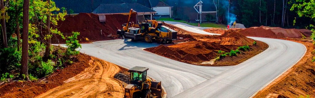 A new North Georgia driveway begins not with grading equipment but with the clearing that exposes the ground surface grading requires. Learn why clearing before grading produces better driveways at lower cost — and what clearing scope driveway development requires in Cherokee County.