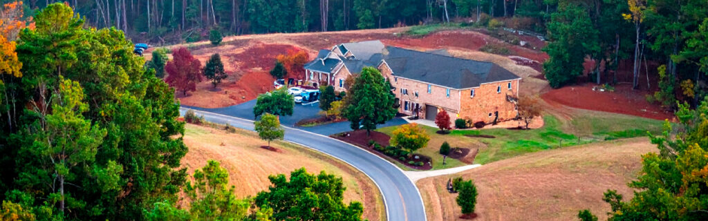 Wooded Cherokee County properties look simpler to improve than they turn out to be — because the conditions that make improvements complex are the conditions the woodland itself conceals. Learn what local conditions specifically require from improvement planning in Cherokee County.