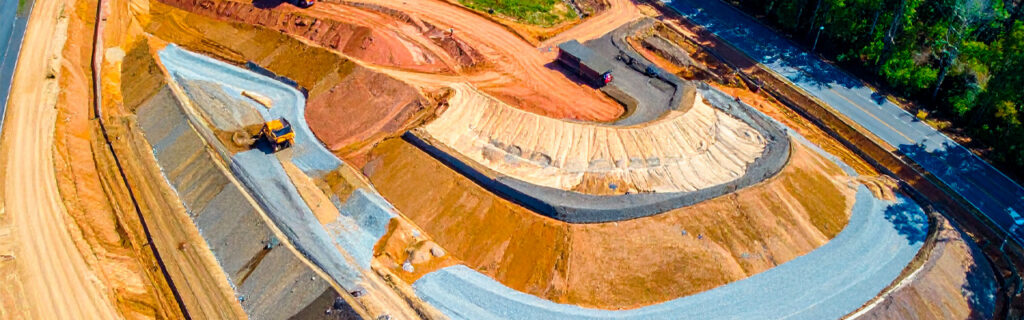Elevation changes on North Georgia properties are not aesthetic terrain features — they determine grading scope, earthwork volume, drainage infrastructure requirements, and improvement location drainage conditions. Learn the elevation-grading connection for Cherokee County properties.