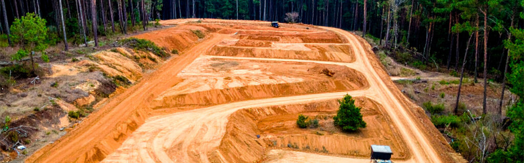 Wooded Cherokee County lots present a planning environment consistently more complex than cleared or simpler terrain lots — and adequate planning reveals that complexity before commitment rather than during execution. Learn what local conditions require from wooded lot improvement planning in Cherokee County.