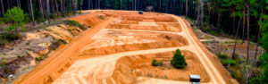 Wooded Cherokee County lots present a planning environment consistently more complex than cleared or simpler terrain lots — and adequate planning reveals that complexity before commitment rather than during execution. Learn what local conditions require from wooded lot improvement planning in Cherokee County.
